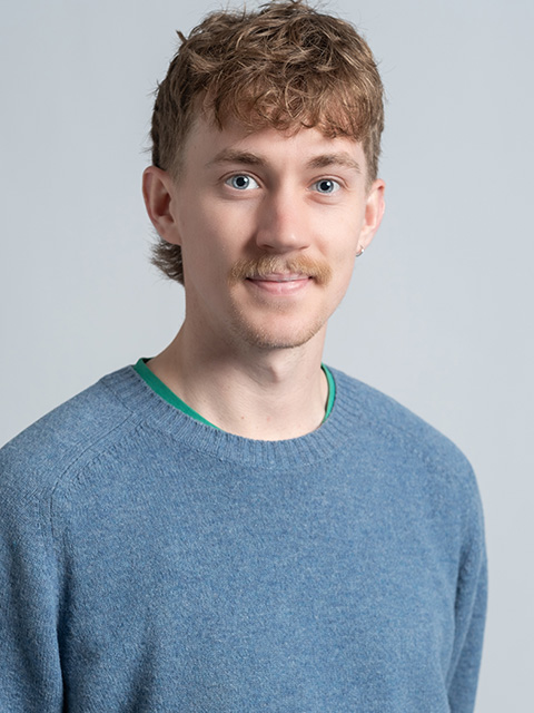 Portrait photograph of ABCE staff member, Tomasz Adamek